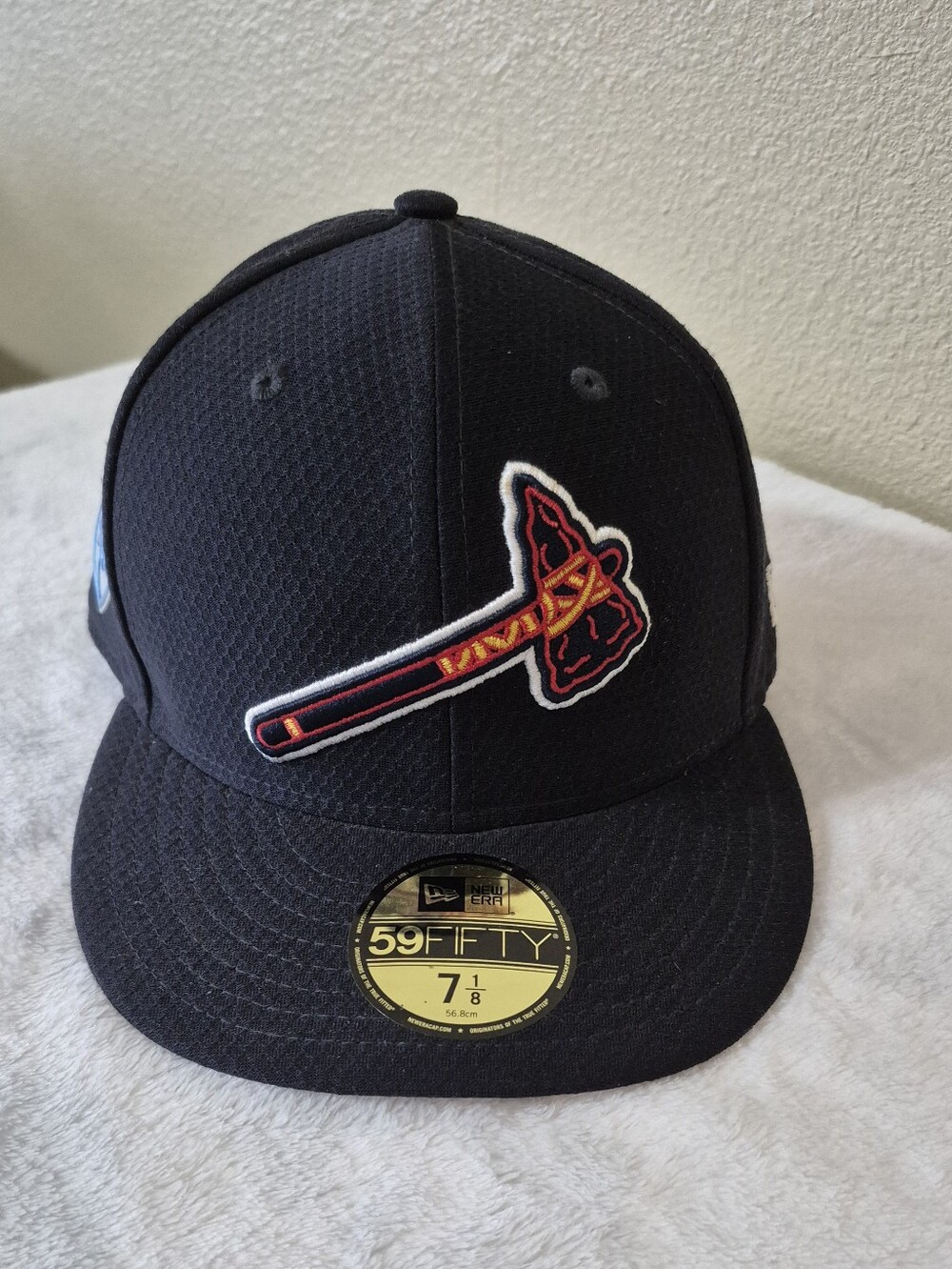 New Era Atlanta Black 59FIFTY Fitted Cap with Tomahawk Logo